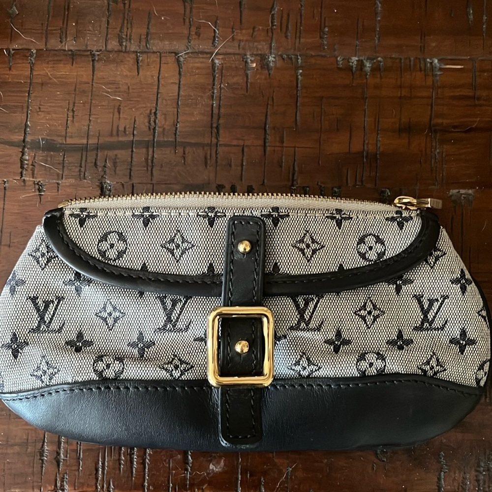 Louis Vuitton blue canvas monogram coin purse 6 in . long and 3 in. wide.